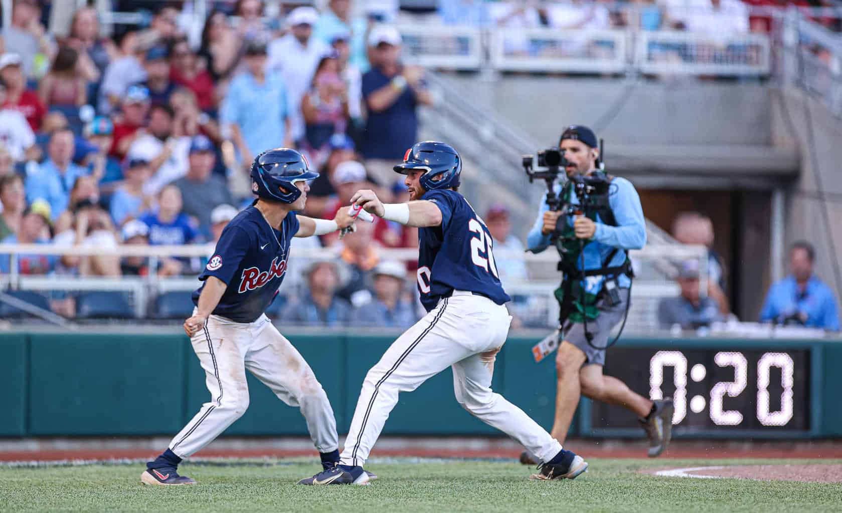 Hot Ole Miss Keeps Rolling, Defeats Arkansas 13-5 To Advance To ...